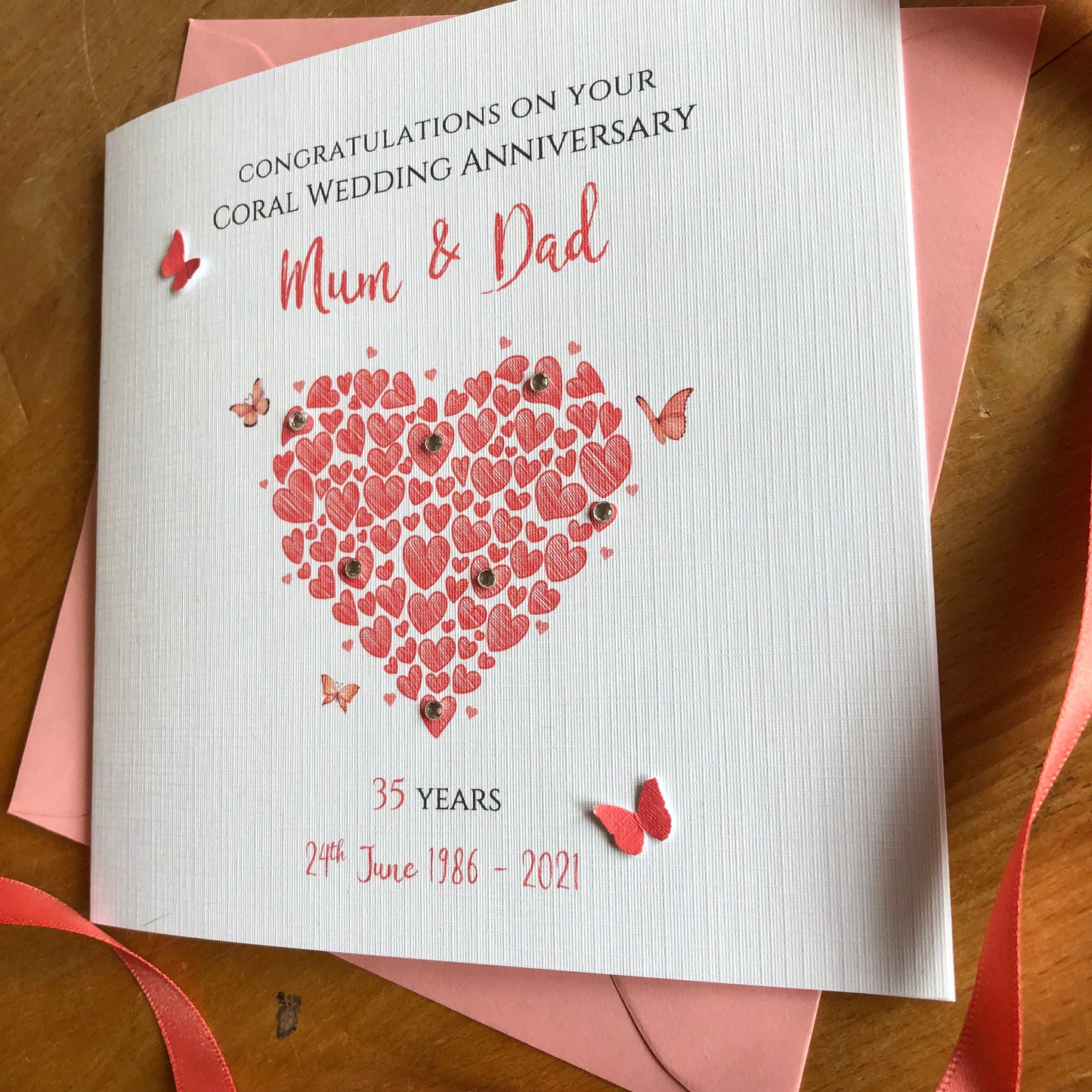 Personalised Coral Wedding Anniversary Card, Heart of Hearts with Butterflies