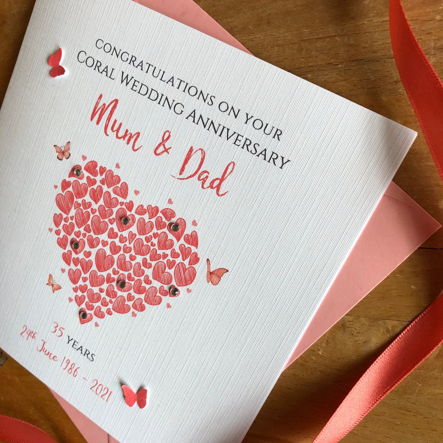 Personalised Coral Wedding Anniversary Card, Heart of Hearts with Butterflies